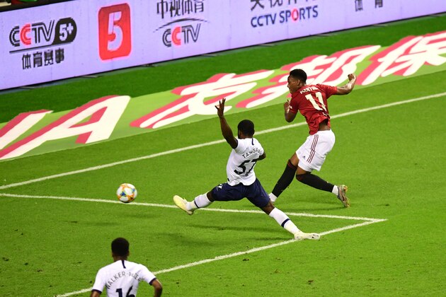 SHANGHAI, CHINA - JULY 25: Anthony Martial of Manchester United scores the opening goal during the International Champions Cup match between Tottenham Hotspur and Manchester United at the Shanghai Hongkou Stadium on July 25, 2019 in Shanghai, China. (Photo by Di Yin/Getty Images)