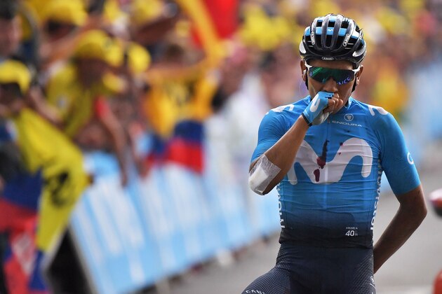 Colombia's Nairo Quintana celebrates as he wins on the finish line of the eighteenth stage of the 106th edition of the Tour de France cycling race between Embrun and Valloire, in Valloire, on July 25, 2019. (Photo by Marco Bertorello / AFP)        (Photo credit should read MARCO BERTORELLO/AFP/Getty Images)