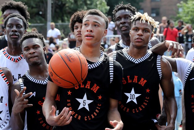 NEW YORK, NY - AUGUST 18:  RJ Hampton #5 and Jahmius Ramsey #10 of Team Ramsey pose for pictures on the court after the game against Team Stanley during the SLAM Summer Classic 2018 at Dyckman Park on August 18, 2018 in New York City.  (Photo by Elsa/Getty Images)