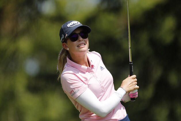 Paula Creamer watches her drive on the seventh tee during the third round of the Dow Great Lakes Bay Invitational golf tournament, Friday, July 19, 2019, in Midland, Mich. (AP Photo/Carlos Osorio)