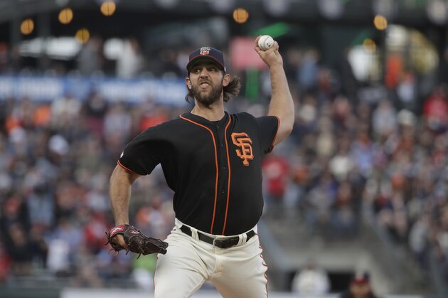 San Francisco Giants pitcher Madison Bumgarner throws against the St. Louis Cardinals during the first inning of a baseball game in San Francisco, Saturday, July 6, 2019. (AP Photo/Jeff Chiu)
