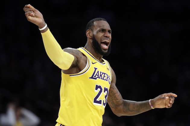 Los Angeles Lakers' LeBron James argues a call during the second half of an NBA basketball game against the Miami Heat Monday, Dec. 10, 2018, in Los Angeles. (AP Photo/Marcio Jose Sanchez)