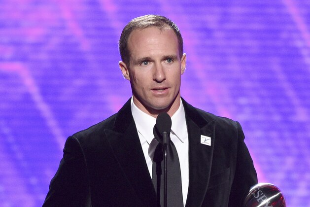 NFL player Drew Brees, of the New Orleans Saints, accepts the award for best record-breaking performance at the ESPY Awards on Wednesday, July 10, 2019, at the Microsoft Theater in Los Angeles. (Photo by Chris Pizzello/Invision/AP)