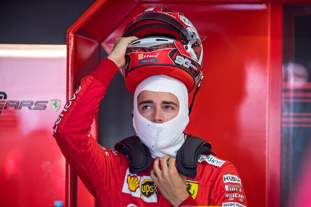 Ferrari's Monegasque driver Charles Leclerc prepares to enter his car during the first practice session of the German Formula One Grand Prix at the Hockenheim racing circuit on July 26, 2019 in Hockenheim, southern Germany. (Photo by ANDREJ ISAKOVIC / AFP)        (Photo credit should read ANDREJ ISAKOVIC/AFP/Getty Images)