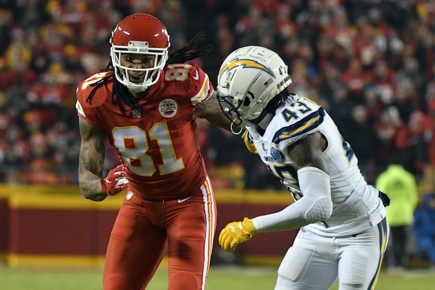 Kansas City Chiefs wide receiver Kelvin Benjamin (81) goes against Los Angeles Chargers cornerback Michael Davis (43) during the second half of an NFL football game in Kansas City, Mo., Thursday, Dec. 13, 2018. (AP Photo/Ed Zurga)