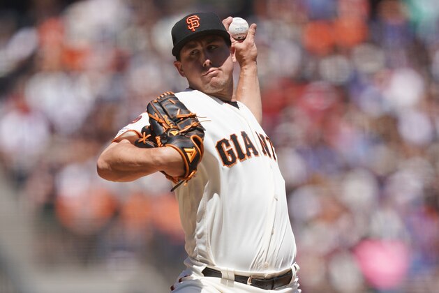 SAN FRANCISCO, CA - JULY 20:  Derek Holland #45 of the San Francisco Giants pitches against the New York Mets in the top of the six inning at Oracle Park on July 20, 2019 in San Francisco, California.  (Photo by Thearon W. Henderson/Getty Images)