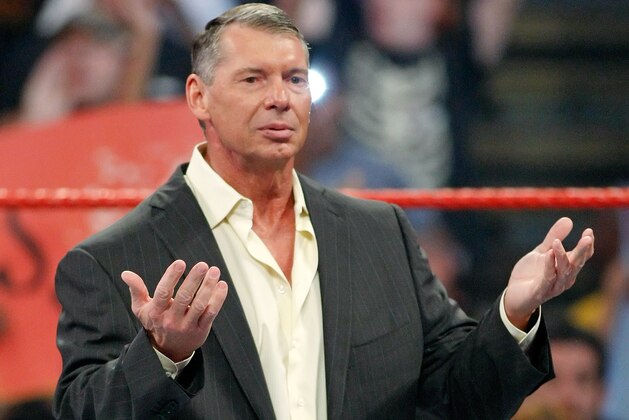 LAS VEGAS - AUGUST 24:  World Wrestling Entertainment Inc. Chairman Vince McMahon appears in the ring during the WWE Monday Night Raw show at the Thomas & Mack Center August 24, 2009 in Las Vegas, Nevada.  (Photo by Ethan Miller/Getty Images)
