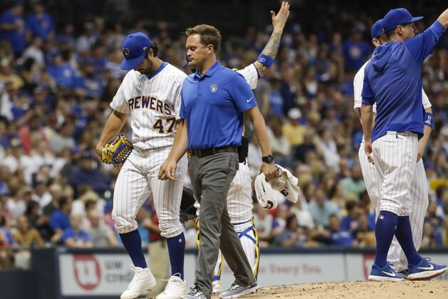 Milwaukee Brewers starting pitcher Gio Gonzalez leaves the game during the seventh inning of a baseball game against the Chicago Cubs Friday, July 26, 2019, in Milwaukee. (AP Photo/Morry Gash)