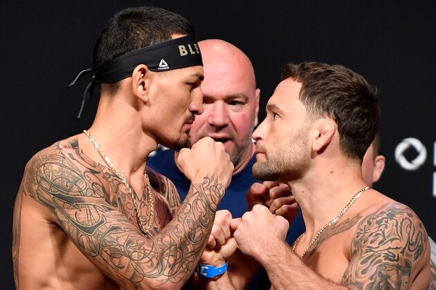 EDMONTON, AB - JULY 26:  (L-R) Max Holloway and Frankie Edgar face off during the UFC 240 weigh-in at Rogers Place on July 26, 2019 in Edmonton, Alberta, Canada. (Photo by Jeff Bottari/Zuffa LLC/Zuffa LLC via Getty Images)
