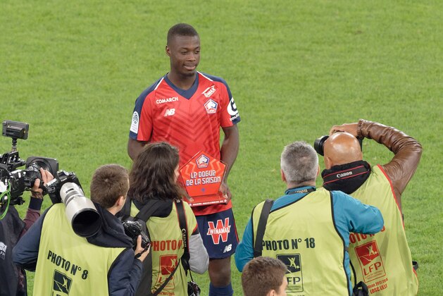LILLE, FRANCE - MAY 18: Lille's Nicolas Pepe receives trophy of