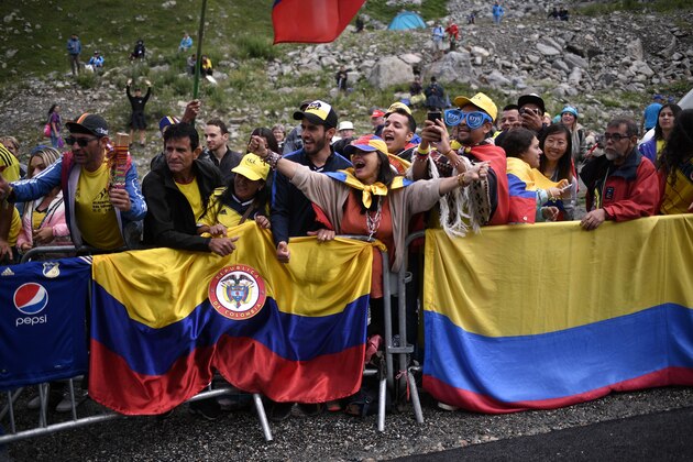 Colombian fans cheer prior to the twentieth stage of the 106th edition of the Tour de France cycling race between Albertville and Val Thorens, in Val Thorens, on July 27, 2019. (Photo by Marco Bertorello / AFP) (Photo credit should read MARCO BERTORELLO/AFP/Getty Images) Colombian fans cheer prior to the twentieth stage of the 106th edition of the Tour de France cycling race between Albertville and Val Thorens, in Val Thorens, on July 27, 2019. (Photo by Marco Bertorello / AFP) (Photo credit should read MARCO BERTORELLO/AFP/Getty Images)