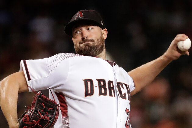 Arizona Diamondbacks starting pitcher Robbie Ray (38) throws against the Baltimore Orioles during the third inning of a baseball game, Monday, July 22, 2019, in Phoenix. (AP Photo/Matt York)