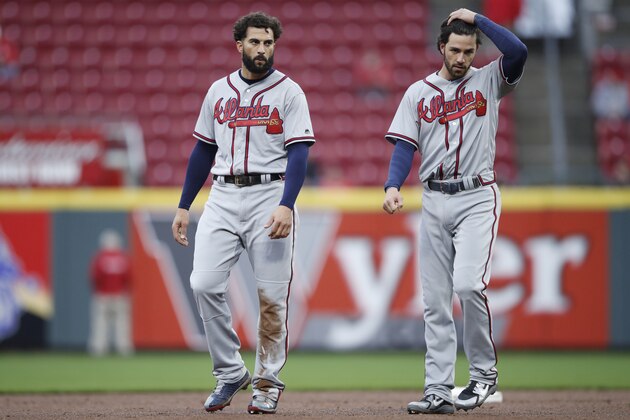 CINCINNATI, OH - APRIL 24: Nick Markakis #22 and Dansby Swanson #7 of the Atlanta Braves look on during a game against the Cincinnati Reds at Great American Ball Park on April 24, 2018 in Cincinnati, Ohio. The Reds won 9-7 in 12 innings. (Photo by Joe Robbins/Getty Images) *** Local Caption *** Nick Markakis;Dansby Swanson