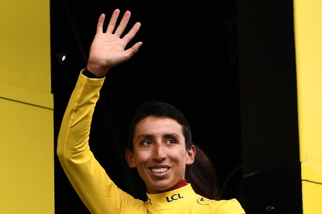 Colombia's Egan Bernal celebrates his overall leader's yellow jersey on the podium of the twentieth stage of the 106th edition of the Tour de France cycling race between Albertville and Val Thorens, in Val Thorens, on July 27, 2019. (Photo by Anne-Christine POUJOULAT / AFP)        (Photo credit should read ANNE-CHRISTINE POUJOULAT/AFP/Getty Images)