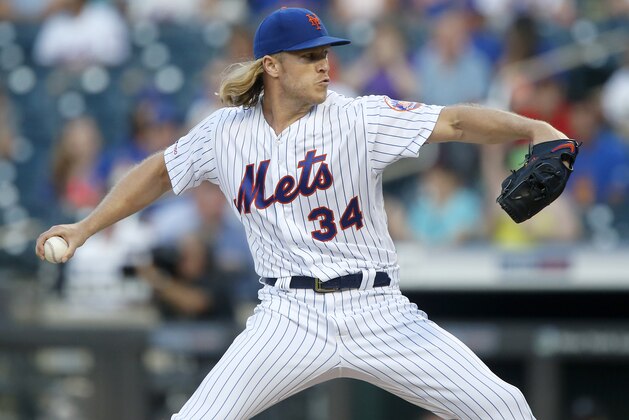 NEW YORK, NEW YORK - JUNE 30:   Noah Syndergaard #34 of the New York Mets in action against the Atlanta Braves at Citi Field on June 30, 2019 in New York City. The Mets defeated the Braves 8-5. (Photo by Jim McIsaac/Getty Images)