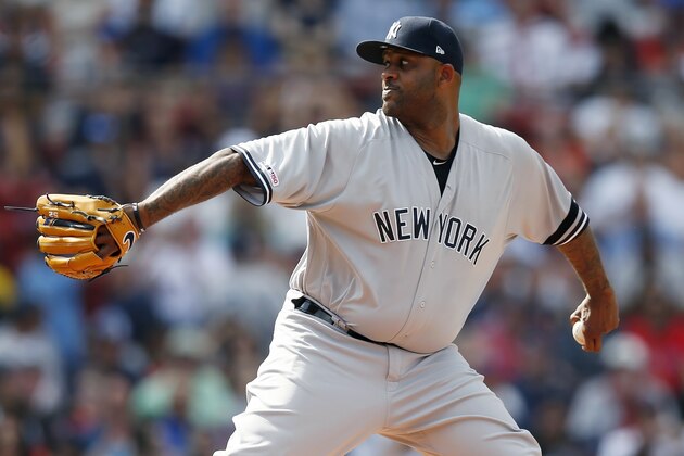 New York Yankees' CC Sabathia pitches during the first inning of a baseball game against the Boston Red Sox in Boston, Saturday, July 27, 2019. (AP Photo/Michael Dwyer)
