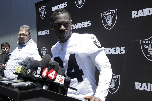 Oakland Raiders wide receiver Antonio Brown speaks to reporters after an official team activity at the NFL football team's headquarters in Alameda, Calif., Tuesday, May 28, 2019. (AP Photo/Jeff Chiu)