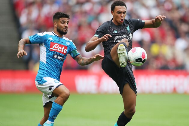 EDINBURGH, SCOTLAND - JULY 28: Trent Alexander-Arnold of Liverpool (R) is challenged by Lorenzo Insigne of SSC Napoli during the Pre-Season Friendly match between Liverpool FC and SSC Napoli at Murrayfield on July 28, 2019 in Edinburgh, Scotland. (Photo by Ian MacNicol/Getty Images)