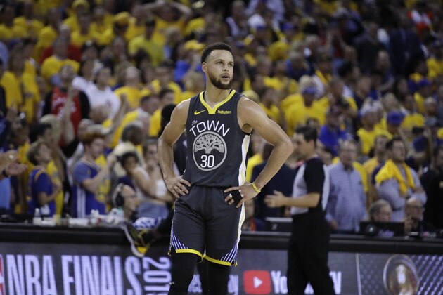 Golden State Warriors' Stephen Curry stands on the court during the second half of Game 6 of basketball's NBA Finals against the Toronto Raptors in Oakland, Calif., Thursday, June 13, 2019. (AP Photo/Ben Margot)