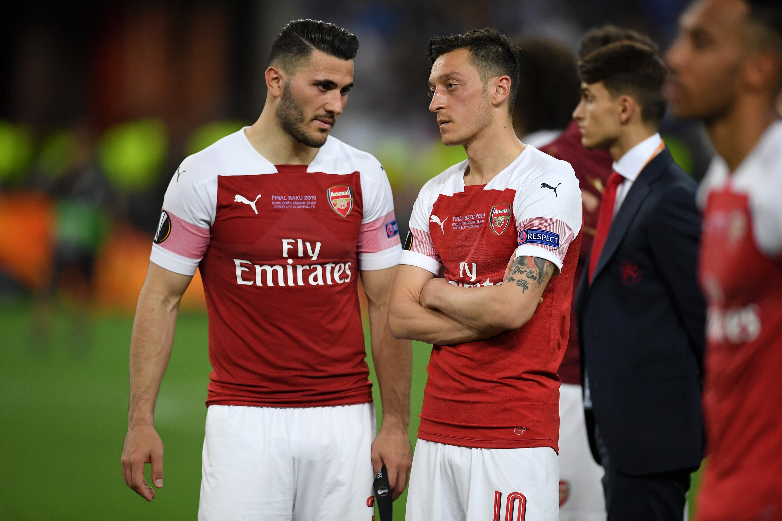 BAKU, AZERBAIJAN - MAY 29:  Sead Kolasinac and Mesut Ozil of Arsenal look dejected following their sides defeat in the UEFA Europa League Final between Chelsea and Arsenal at Baku Olimpiya Stadionu on May 29, 2019 in Baku, Azerbaijan. (Photo by Michael Regan/Getty Images)