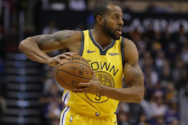 Golden State Warriors guard Andre Iguodala (9) in the first half during an NBA basketball game against the Phoenix Suns, Monday, Dec. 31, 2018, in Phoenix. (AP Photo/Rick Scuteri)