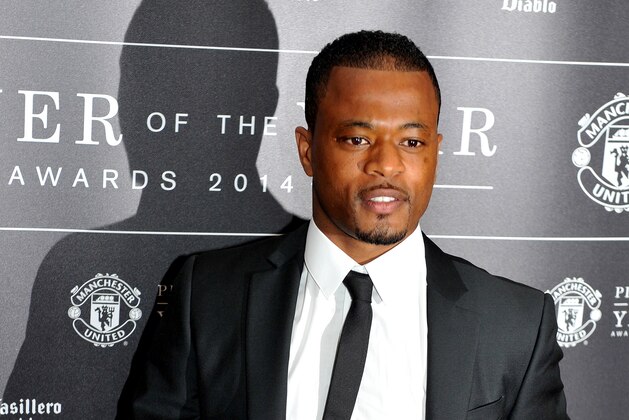 MANCHESTER, ENGLAND - MAY 08:  Patrice Evra attends the Manchester United Player of the Year awards at Old Trafford on May 8, 2014 in Manchester, England.  (Photo by Shirlaine Forrest/Getty Images)