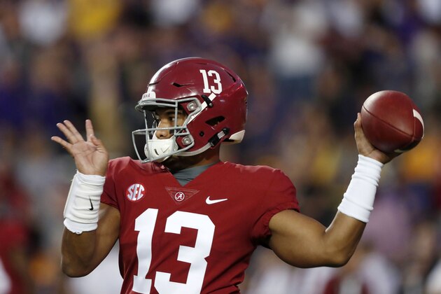 Alabama quarterback Tua Tagovailoa (13) warms up before an NCAA college football game against LSU in Baton Rouge, La., Saturday, Nov. 3, 2018. (AP Photo/Gerald Herbert)