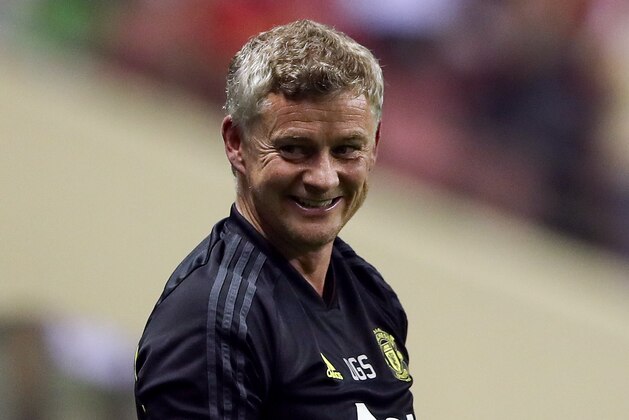 SHANGHAI, CHINA - JULY 25:  Manager Ole Gunnar Solskjaer of Manchester United reacts during the International Champions Cup match between Tottenham Hotspur and Manchester United at the Shanghai Hongkou Stadium on July 25, 2019 in Shanghai, China.  (Photo by Lintao Zhang/International Champions Cup/Getty Images)