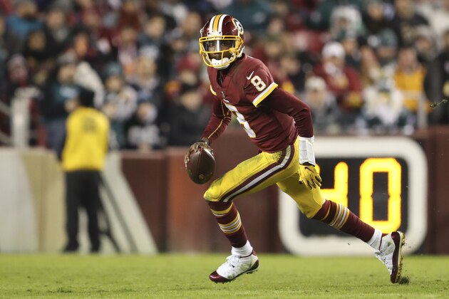 Washington Redskins quarterback Josh Johnson scrambles during the second half of an NFL football game against the Philadelphia Eagles, Sunday, Dec. 30, 2018, in Landover, Md. The Eagles defeated the Redskins 24-0. (AP Photo/Andrew Harnik)