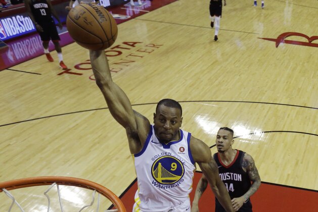 Golden State Warriors forward Andre Iguodala (9) scores past Houston Rockets guard Gerald Green (14) in the second half during Game 1 of the NBA Western Conference Finals, Monday, May 14, 2018, in Houston. (AP Photo/David J. Phillip)