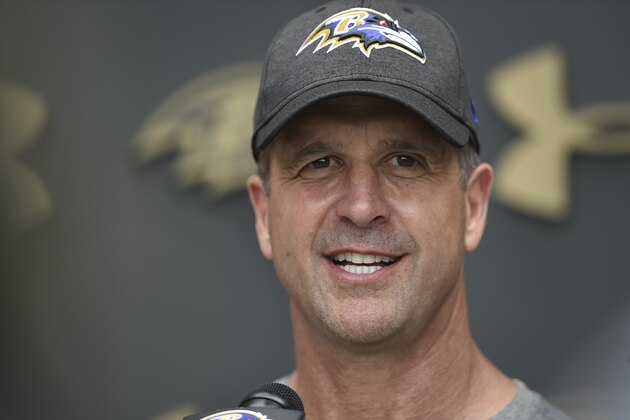 Baltimore Ravens head coach John Harbaugh answers questions from reporters after a NFL football practice Thursday, June 6, 2019, in Owings Mills, Md. (AP Photo/Gail Burton)