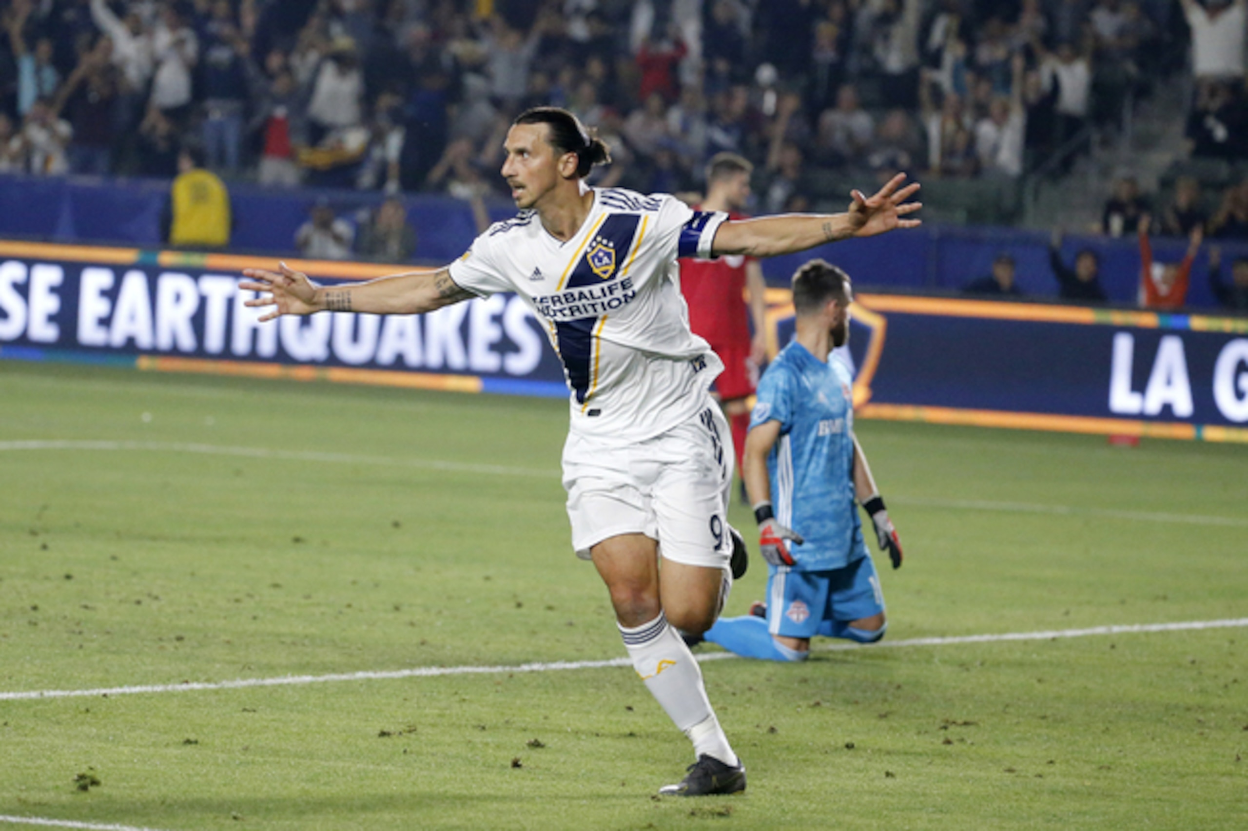 LA Galaxy forward Zlatan Ibrahimovic (9) celebrates scoring a goal during the second half of the team's MLS soccer match against Toronto FC in Carson, Calif., Thursday, July 4, 2019. The Galaxy won 2-0. (AP Photo/Ringo H.W. Chiu) LA Galaxy forward Zlatan Ibrahimovic (9) celebrates scoring a goal during the second half of the team's MLS soccer match against Toronto FC in Carson, Calif., Thursday, July 4, 2019. The Galaxy won 2-0. (AP Photo/Ringo H.W. Chiu)