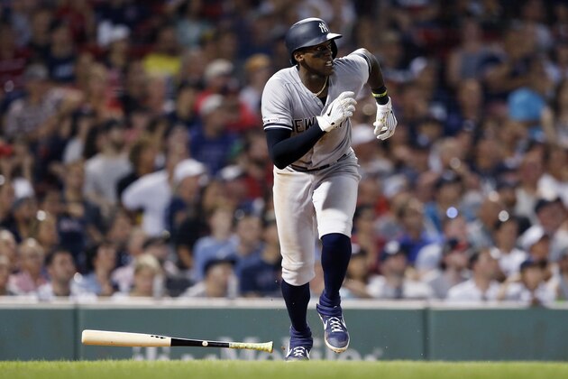 New York Yankees' Cameron Maybin runs on his double during the eighth inning of a baseball game against the Boston Red Sox in Boston, Sunday, July 28, 2019. (AP Photo/Michael Dwyer)