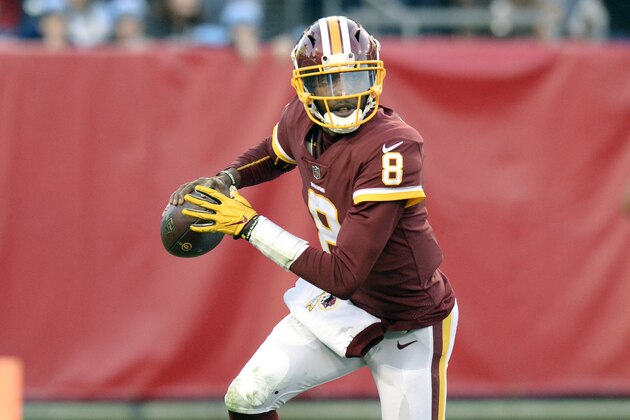 Washington Redskins quarterback Josh Johnson plays against the Tennessee Titans in the first half of an NFL football game Saturday, Dec. 22, 2018, in Nashville, Tenn. (AP Photo/Mark Zaleski)