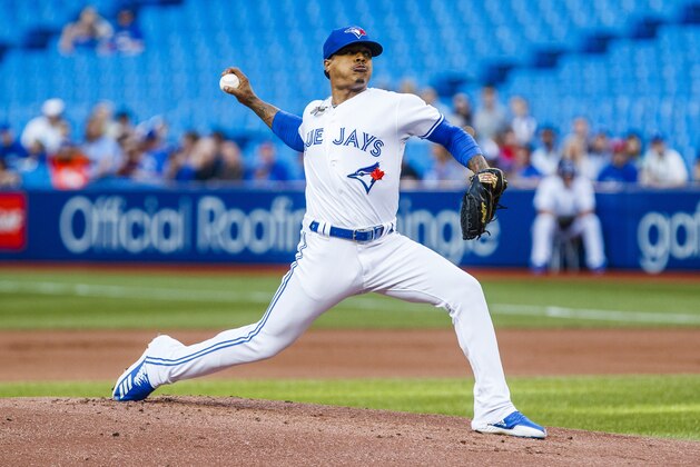 TORONTO, ONTARIO - JULY 24: Marcus Stroman #6 of the Toronto Blue Jays pitches to the Cleveland Indians in the first inning during their MLB game at the Rogers Centre on July 24, 2019 in Toronto, Canada. (Photo by Mark Blinch/Getty Images)