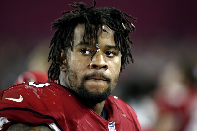 Arizona Cardinals defensive tackle Robert Nkemdiche stands on the sidelines against the Oakland Raiders during the second half of an NFL preseason football game, Saturday, Aug. 12, 2017, in Glendale, Ariz. The Cardinals won 20-10. (AP Photo/Ross D. Franklin)