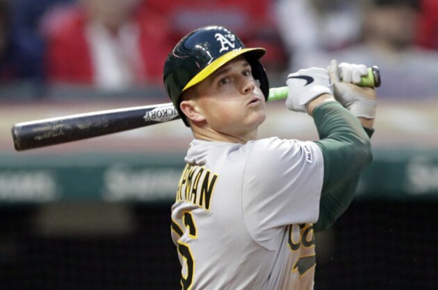 Oakland Athletics' Matt Chapman watches his ball after hitting against Cleveland Indians starting pitcher Trevor Bauer in the sixth inning of a baseball game, Tuesday, May 21, 2019, in Cleveland. (AP Photo/Tony Dejak)