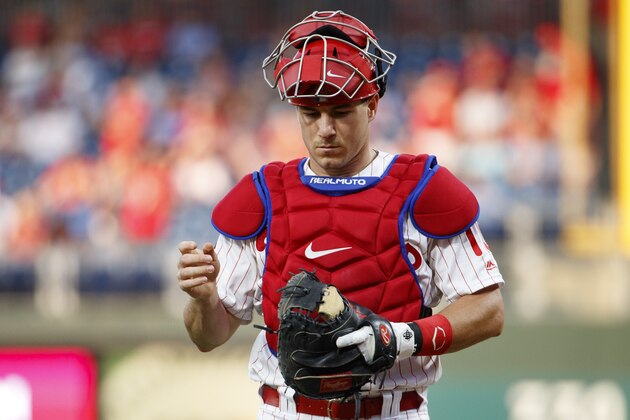 Philadelphia Phillies catcher J.T. Realmuto looks on during the first inning of a baseball game against the Atlanta Braves, Friday, July 26, 2019, in Philadelphia. Braves won 9-2. (AP Photo/Chris Szagola)