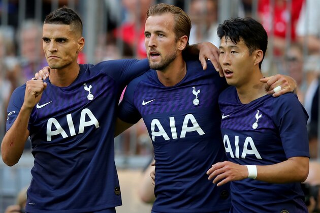 MUNICH, GERMANY - JULY 30: Harry Kane (C) of Tottenham Hotspur celebrates after scoring his team's first goal with team mates Erik Lamela (L) and Heung-Min Son during the Audi cup 2019 semi final match between Real Madrid and Tottenham Hotspur at Allianz Arena on July 30, 2019 in Munich, Germany. (Photo by Alexander Hassenstein/Getty Images for AUDI)