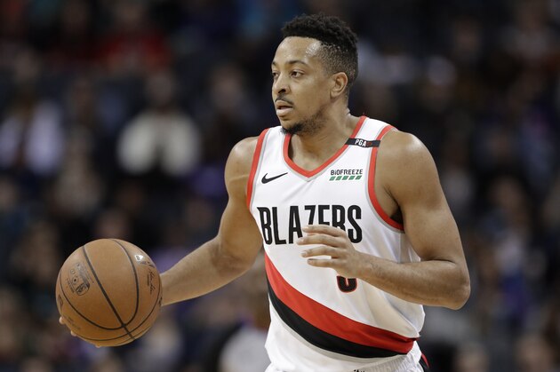 Portland Trail Blazers' CJ McCollum (3) brings the ball up court against the Charlotte Hornets during the first half of an NBA basketball game in Charlotte, N.C., Sunday, March 3, 2019. (AP Photo/Chuck Burton)