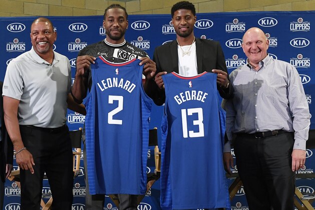 LOS ANGELES, CA - JULY 24: (L-R) Head coach Doc Rivers, Paul George, Kawhi Leonard and owner Steve Ballmer of the Los Angeles Clippers attend the Paul George and Kawhi Leonard introductory press conference at Green Meadows Recreation Center on July 24, 2019 in Los Angeles, California. NOTE TO USER: User expressly acknowledges and agrees that, by downloading and or using this photograph, User is consenting to the terms and conditions of the Getty Images License Agreement. (Photo by Kevork Djansezian/Getty Images)