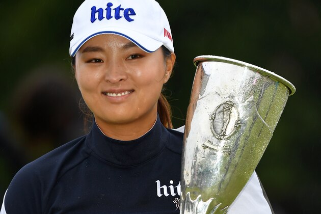 EVIAN-LES-BAINS, FRANCE - JULY 28: Jin Young Ko of South Korea celebrates with the trophy following the Evian Championship at Evian Resort Golf Club on July 28, 2019 in Evian-les-Bains, France. (Photo by Stuart Franklin/Getty Images)