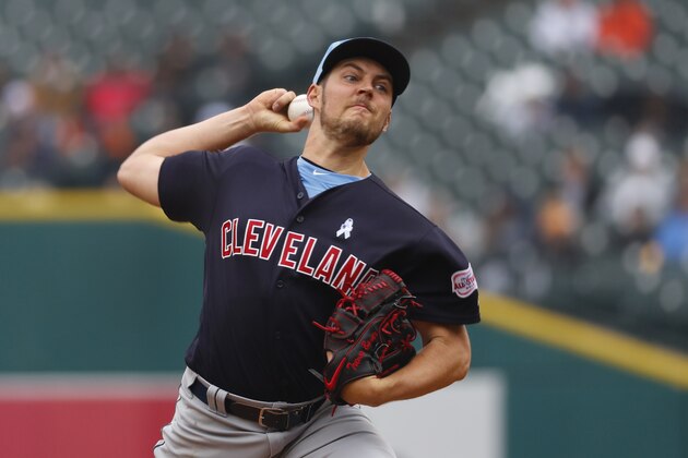 Cleveland Indians pitcher Trevor Bauer throws in the seventh inning of a baseball game against the Detroit Tigers in Detroit, Sunday, June 16, 2019. (AP Photo/Paul Sancya)