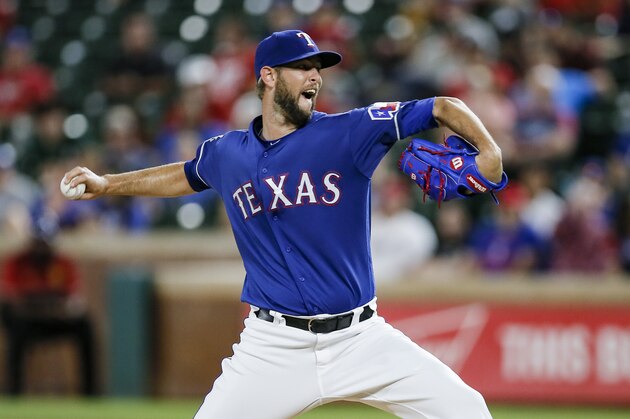 Texas Rangers relief pitcher Chris Martin (31) throws during the eighth inning of a baseball game against the Baltimore Orioles, Wednesday, June 5, 2019, in Arlington, Texas. Texas won 2-1 in 12 innings. (AP Photo/Brandon Wade)