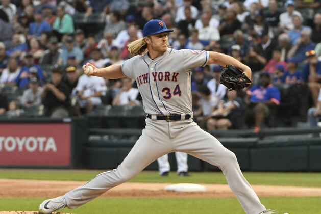 New York Mets starting pitcher Noah Syndergaard throws to a Chicago White Sox batter during the first inning of a baseball game Tuesday, July 30, 2019, in Chicago. (AP Photo/David Banks)