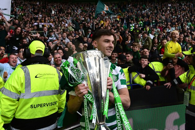GLASGOW, SCOTLAND - MAY 19: Kieran Tierney of Celtic with the League Trophy during the Ladbrokes Scottish Premiership match between Celtic FC and Heart of Midlothian FC at Celtic Park on May 19, 2019 in Glasgow, Scotland. (Photo by Mark Runnacles/Getty Images)