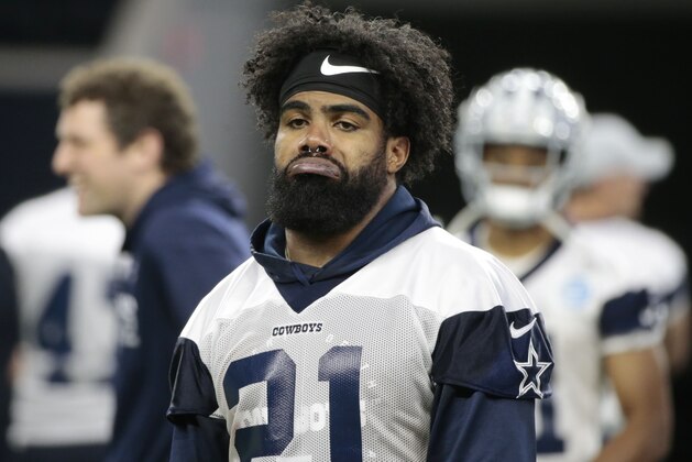 Dallas Cowboys running back Ezekiel Elliott (21) walks off the field after NFL football practice in Frisco, Texas, Wednesday, May. 22, 2019. (AP Photo/Michael Ainsworth)
