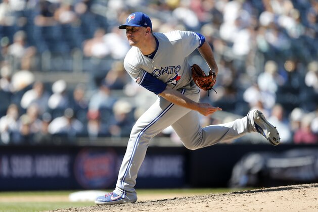 NEW YORK, NEW YORK - JULY 13:   Daniel Hudson #46 of the Toronto Blue Jays in action against the New York Yankees at Yankee Stadium on July 13, 2019 in New York City. The Blue Jays defeated the Yankees 2-1. (Photo by Jim McIsaac/Getty Images)