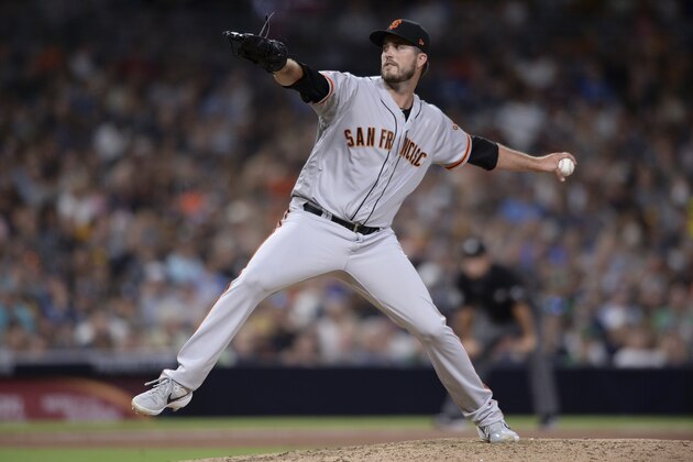 San Francisco Giants relief pitcher Drew Pomeranz works against a San Diego Padres batter during the seventh inning of a baseball game Saturday, July 27, 2019, in San Diego. (AP Photo/Orlando Ramirez)