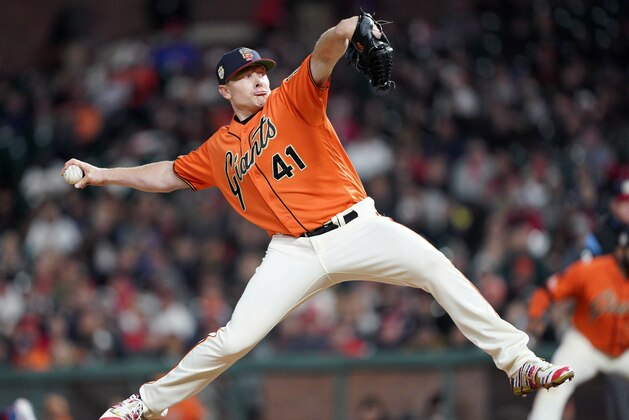San Francisco Giants relief pitcher Mark Melancon (41) throws against the St. Louis Cardinals during the seventh inning of a baseball game in San Francisco, Friday, July 5, 2019. (AP Photo/Tony Avelar)